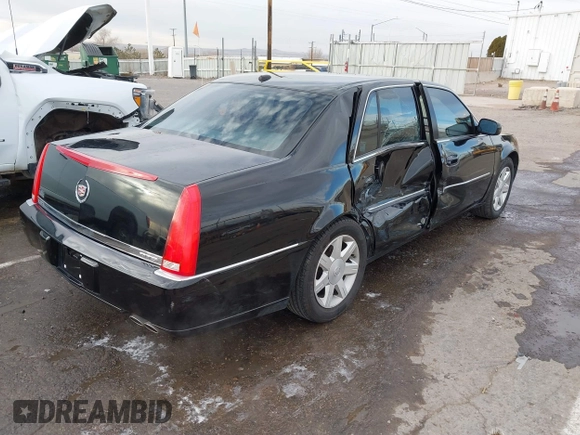 2006 Cadillac DTS w/1SC with VIN 1G6KD57Y96U251691, listed as a IAAI auction lot 41086147 with 128,959 mi miles. Bid and sale history available at carsss.com. Image 4.