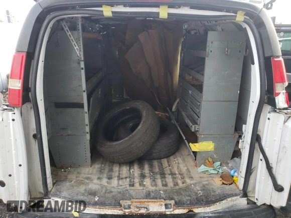 2013 Chevrolet Express Cargo z VIN 1GCZGTCG2D1192230, wystawiony jako Copart lot #73691204 z przebiegiem 170 078 mil mil oraz Szkoda całkowita • Salvage title. Historia ofert i sprzedaży dostępna na DreamBid. Obrazek 11.