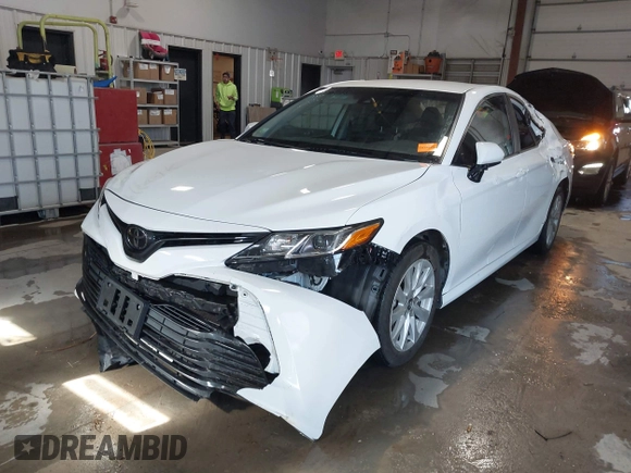 2019 Toyota Camry LE with VIN 4T1B11HK4KU853137, listed as a IAAI auction lot 41633785 with 67,629 mi miles and . Bid and sale history available at DreamBid. Image 17.