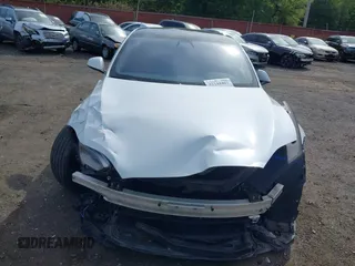 2022 Tesla Model S with VIN 5YJSA1E58NF467644, listed as a IAAI auction lot 42344403 with 52,628 mi miles and . Bid and sale history available at DreamBid. Image 12.