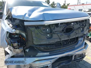2022 Ford F-150 Lightning Pro с VIN 1FT6W1EV0NWG05515, выставлен на аукционе IAAI как лот 42343136 с пробегом 49 544 миль миль и . История ставок и продаж доступна на DreamBid. Изображение 6.