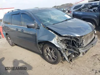 2010 Honda Odyssey EX-L with VIN 5FNRL3H7XAB099821, listed as a IAAI auction lot 41680729 with 217,458 mi miles and . Bid and sale history available at DreamBid. Image 1.