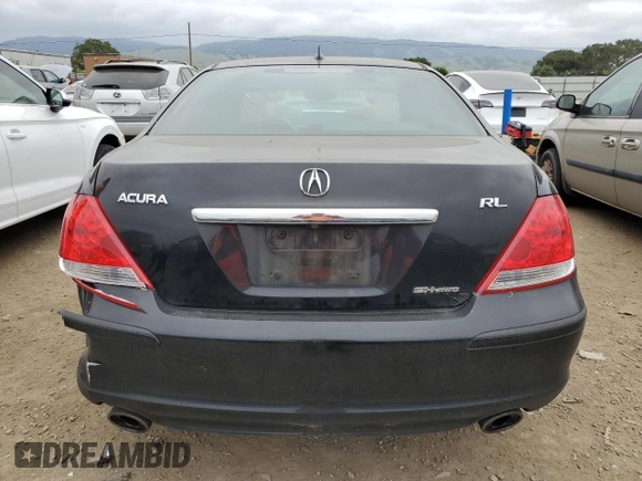 2006 Acura RL z VIN JH4KB16506C011226, wystawiony jako Copart lot #53918385 z przebiegiem 200 433 mil mil oraz Szkoda całkowita • Salvage title. Historia ofert i sprzedaży dostępna na DreamBid. Obrazek 6.