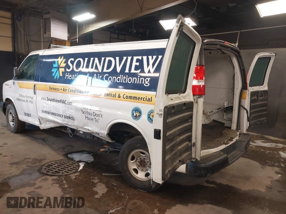 2020 Chevrolet Express Cargo Van with VIN 1GCWGBFB4L1205443, listed as a IAAI auction lot 41612714 with 87,883 mi miles. Bid and sale history available at carsss.com. Image 3.