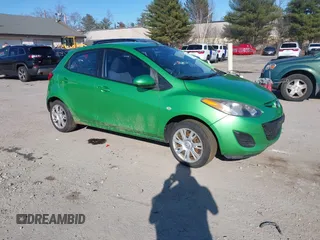 2012 Mazda 2 Sport with VIN JM1DE1KZ6C0132947, listed as a IAAI auction lot 41773784 with 222,708 mi miles. Bid and sale history available at carsss.com. Image 1.