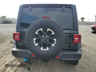2024 Jeep Wrangler Rubicon z VIN 1C4RJXR6XRW291900, wystawiony jako Copart lot #61682885 z przebiegiem Nie podano mil oraz Szkoda całkowita • Salvage title. Historia ofert i sprzedaży dostępna na DreamBid. Obrazek 6.
