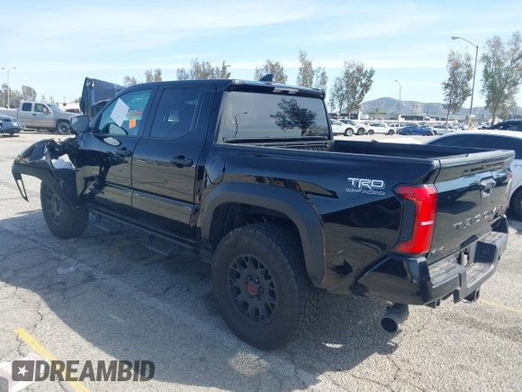 2025 Toyota Tacoma SR with VIN 3TMLB5JN2SM090007, listed as a IAAI auction lot 41830185 with 4,359 mi miles and . Bid and sale history available at DreamBid. Image 3.