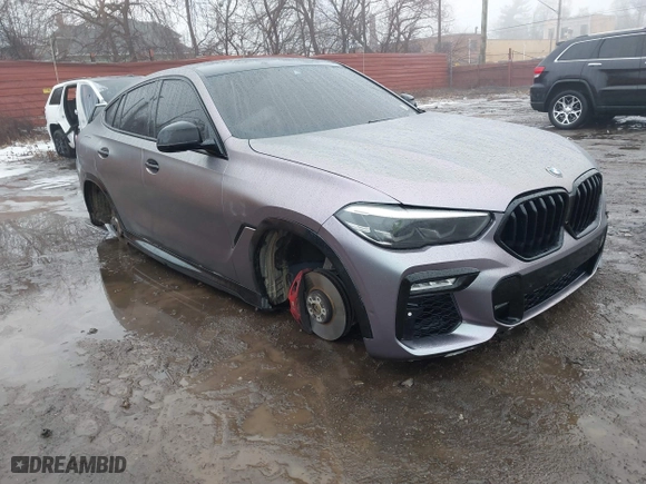 2021 BMW X6 xDrive40i with VIN 5UXCY6C07M9G44005, listed as a IAAI auction lot 41428636 with 65,670 mi miles. Bid and sale history available at carsss.com. Image 1.