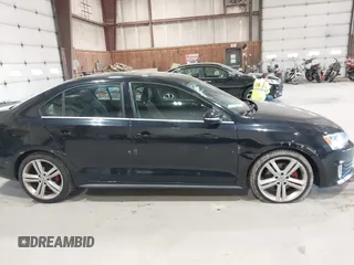 2015 Volkswagen Jetta Sedan 2.0T GLI SE with VIN 3VW5T7AJ0FM275867, listed as a IAAI auction lot 42133491 with 98,718 mi miles. Bid and sale history available at carsss.com. Image 12.
