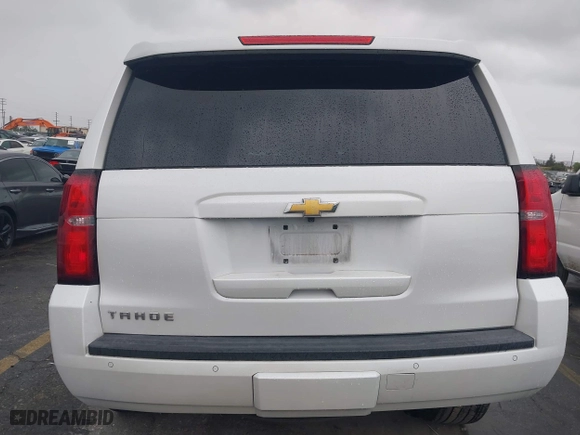 2018 Chevrolet Tahoe LT with VIN 1GNSKBKC7JR351112, listed as a IAAI auction lot 41732631 with 103,771 mi miles. Bid and sale history available at carsss.com. Image 16.
