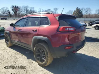 2015 Jeep Cherokee Trailhawk z VIN 1C4PJMBBXFW615145, wystawiony jako Copart lot #47294225 z przebiegiem 99 662 mil mil oraz Szkoda całkowita • Salvage title. Historia ofert i sprzedaży dostępna na DreamBid. Obrazek 2.