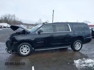 2019 GMC Yukon XL SLT with VIN 1GKS2GKC0KR247038, listed as a IAAI auction lot 41573870 with 133,865 mi miles and . Bid and sale history available at DreamBid. Image 14.
