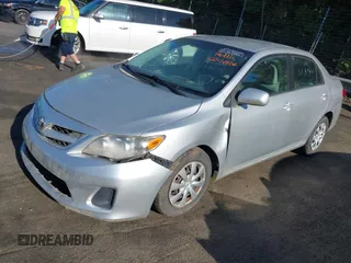 2011 Toyota Corolla L with VIN 2T1BU4EE9BC713402, listed as a IAAI auction lot 42044806 with 121,894 mi miles. Bid and sale history available at carsss.com. Image 2.