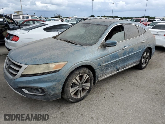 2014 Honda Crosstour EX-L with VIN 5J6TF1H57EL001003, listed as a Copart auction lot 74712234 with 0 mi miles and Salvage Title. Bid and sale history available at carsss.com. Image 1.