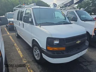 2014 Chevrolet Express Cargo z VIN 1GCSGAFX3E1200712, wystawiony jako IAAI lot #42854205 z przebiegiem 64 421 mil mil oraz . Historia ofert i sprzedaży dostępna na DreamBid. Obrazek 2.