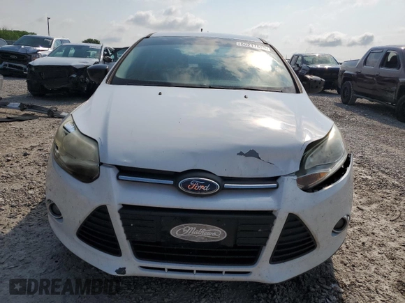 2012 Ford Focus SE z VIN 1FAHP3F2XCL310660, wystawiony jako Copart lot #60217625 z przebiegiem 208 807 mil mil oraz Szkoda całkowita • Salvage title. Historia ofert i sprzedaży dostępna na DreamBid. Obrazek 5.