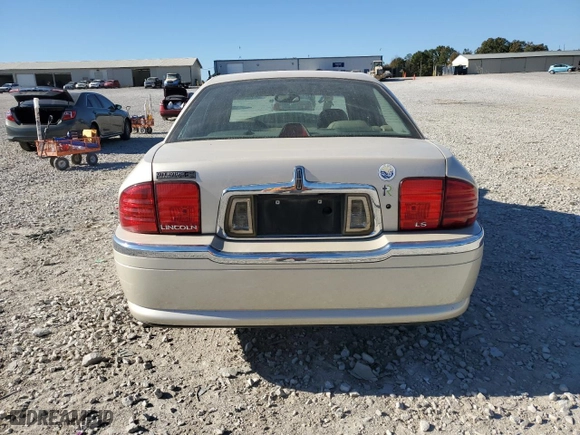 2000 Lincoln LS with VIN 1LNHM86S3YY877685, listed as a Copart auction lot 77091934 with 99,560 mi miles and Salvage Title. Bid and sale history available at carsss.com. Image 6.