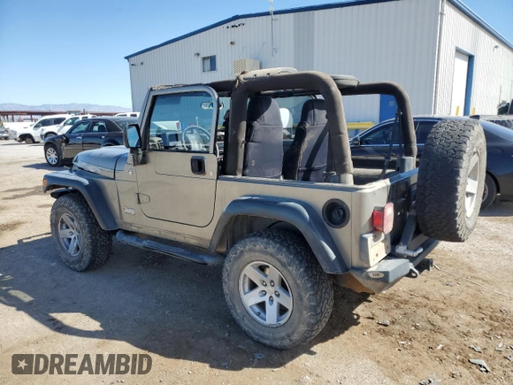 2006 Jeep Wrangler Rubicon with VIN 1J4FA69S36P744801, listed as a Copart auction lot 46541575 with 164,347 mi miles and Salvage title. Bid and sale history available at DreamBid. Image 2.