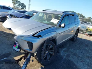 2022 Volkswagen Atlas SE z VIN 1V2JP2CA6NC502757, wystawiony jako IAAI lot #41247026 z przebiegiem 70 124 mil mil oraz . Historia ofert i sprzedaży dostępna na DreamBid. Obrazek 17.