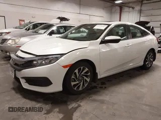 2018 Honda Civic EX with VIN 19XFC2F74JE005647, listed as a IAAI auction lot 41938607 with 90,263 mi miles and . Bid and sale history available at DreamBid. Image 2.