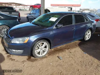 2012 Volkswagen Passat SE w/Sunroof with VIN 1VWBM7A39CC101522, listed as a IAAI auction lot 41484783 with 198,622 mi miles. Bid and sale history available at carsss.com. Image 2.
