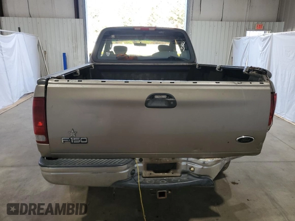 2003 Ford F-150 XL with VIN 1FTRX17283NA46215, listed as a Copart auction lot 85194094 with 168,415 mi miles and Salvage title. Bid and sale history available at DreamBid. Image 6.