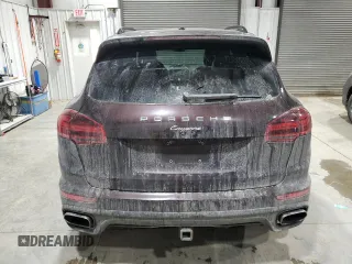 2017 Porsche Cayenne z VIN WP1AA2A24HKA91141, wystawiony jako Copart lot #88939575 z przebiegiem 72 140 mil mil oraz Szkoda całkowita • Salvage title. Historia ofert i sprzedaży dostępna na DreamBid. Obrazek 6.