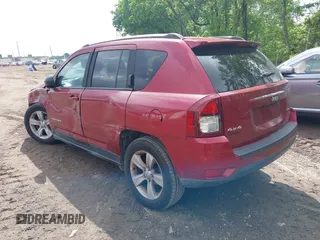 2014 Jeep Compass Sport with VIN 1C4NJDBB8ED799048, listed as a IAAI auction lot 39434584 with 119,507 mi miles. Bid and sale history available at carsss.com. Image 3.