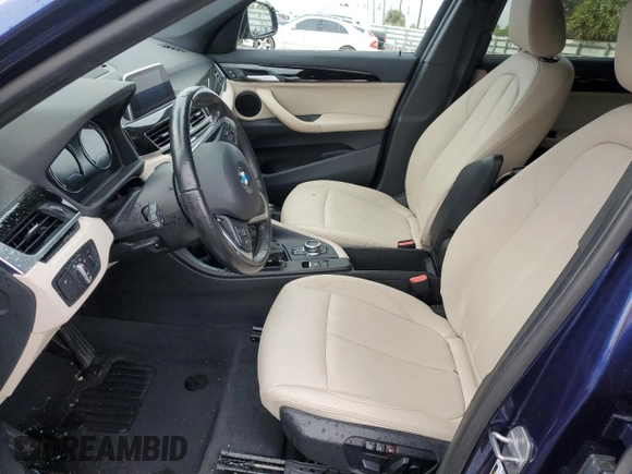 2018 BMW X1 sDrive28i with VIN WBXHU7C33J3F04439, listed as a Copart auction lot 45034033 with 28,091 mi miles. Bid and sale history available at carsss.com. Image 7.