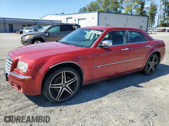 2008 Chrysler 300 C Hemi with VIN 2C3KA63H48H218609, listed as a Copart auction lot 69054664 with 184,118 mi miles and Salvage Title. Bid and sale history available at carsss.com. Image 1.