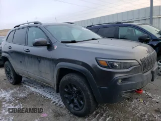 2019 Jeep Cherokee Trailhawk with VIN 1C4PJMBN5KD143033, listed as a Copart auction lot 45791865 with 88,355 mi miles and Clean Title. Bid and sale history available at DreamBid. Image 4.