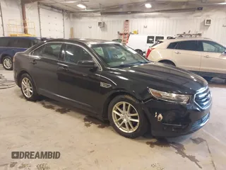 2013 Ford Taurus SEL z VIN 1FAHP2E87DG231490, wystawiony jako IAAI lot #42297947 z przebiegiem 186 994 mil mil oraz . Historia ofert i sprzedaży dostępna na DreamBid. Obrazek 1.