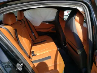 2022 BMW M5 z VIN WBS83CH01NCH75182, wystawiony jako Copart lot #46284903 z przebiegiem Nie podano mil oraz . Historia ofert i sprzedaży dostępna na DreamBid. Obrazek 10.