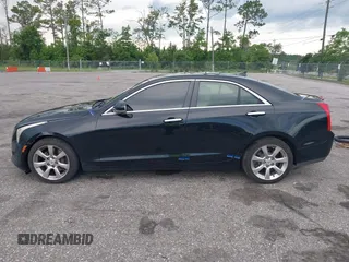 2014 Cadillac ATS Luxury AWD with VIN 1G6AH5RX5E0105296, listed as a IAAI auction lot 42534349 with 219,887 mi miles and . Bid and sale history available at DreamBid. Image 14.