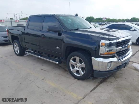 2018 Chevrolet Silverado 1500 LT with VIN 3GCPCREC5JG557884, listed as a IAAI auction lot 41889798 with 112,668 mi miles. Bid and sale history available at carsss.com. Image 1.