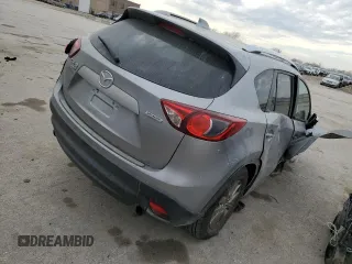 2014 Mazda CX-5 Touring with VIN JM3KE4CY1E0426409, listed as a Copart auction lot 84185294 with 0 mi miles and Salvage Title. Bid and sale history available at carsss.com. Image 3.