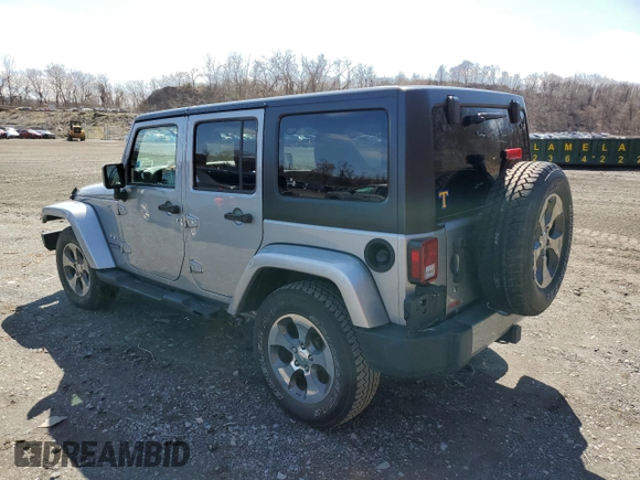 2018 Jeep Wrangler Unlimited Sahara z VIN 1C4BJWEG9JL835996, wystawiony jako Copart lot #51099005 z przebiegiem 42 962 mil mil oraz Szkoda całkowita • Salvage title. Historia ofert i sprzedaży dostępna na DreamBid. Obrazek 2.