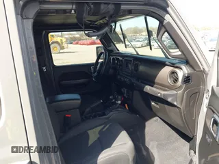 2020 Jeep Gladiator Sport S z VIN 1C6HJTAG7LL154664, wystawiony jako IAAI lot #42033131 z przebiegiem 73 282 mil mil oraz . Historia ofert i sprzedaży dostępna na DreamBid. Obrazek 5.