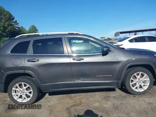 2016 Jeep Cherokee Latitude z VIN 1C4PJLCB6GW159039, wystawiony jako IAAI lot #42274817 z przebiegiem 136 269 mil mil oraz . Historia ofert i sprzedaży dostępna na DreamBid. Obrazek 14.