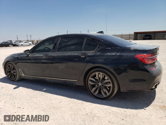 2018 BMW 7 Series M760i xDrive with VIN WBA7H6C51JG614580, listed as a Copart auction lot 65748304 with 46,801 mi miles and Clean Title. Bid and sale history available at carsss.com. Image 2.