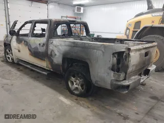 2014 Chevrolet Silverado 1500 LT with VIN 3GCUKREC4EG403078, listed as a IAAI auction lot 41684579 with 116,981 mi miles. Bid and sale history available at carsss.com. Image 3.