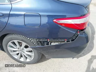 2015 Toyota Camry LE z VIN 4T1BD1FK6FU170842, wystawiony jako IAAI lot #41860403 z przebiegiem 108 482 mil mil oraz . Historia ofert i sprzedaży dostępna na DreamBid. Obrazek 6.