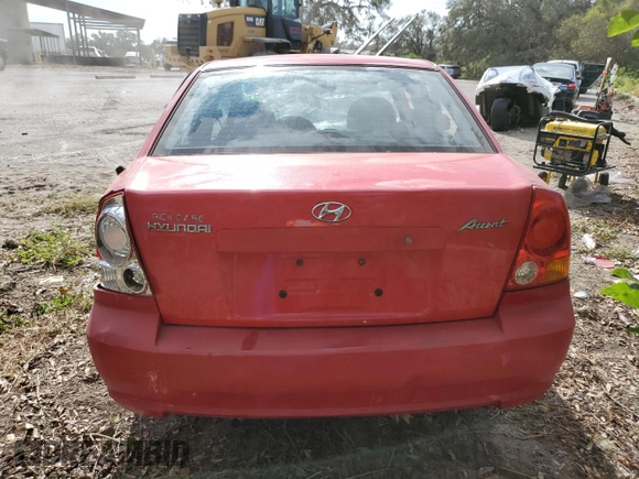 2005 Hyundai Accent GLS with VIN KMHCG45CX5U618473, listed as a Copart auction lot 76752994 with 0 mi miles and Salvage Title. Bid and sale history available at carsss.com. Image 6.