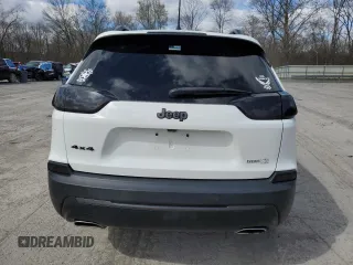 2021 Jeep Cherokee 80th Anniversary with VIN 1C4PJMMX4MD135393, listed as a Copart auction lot 52033255 with 76,546 mi miles and Salvage Title. Bid and sale history available at carsss.com. Image 6.