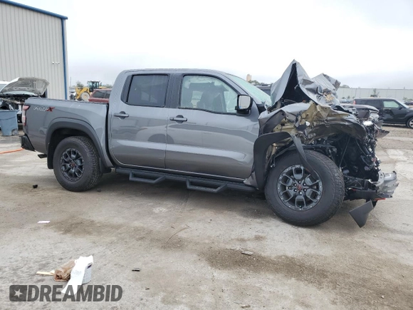 2024 Nissan Frontier Pro-X z VIN 1N6ED1EJ2RN605409, wystawiony jako Copart lot #85559674 z przebiegiem 6 850 mil mil oraz Nie do naprawy • Non repairable. Historia ofert i sprzedaży dostępna na DreamBid. Obrazek 4.