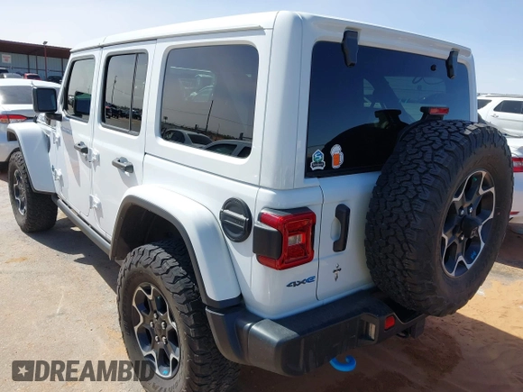 2023 Jeep Wrangler Rubicon with VIN 1C4JJXR63PW580370, listed as a IAAI auction lot 42017282 with 31,823 mi miles and . Bid and sale history available at DreamBid. Image 3.