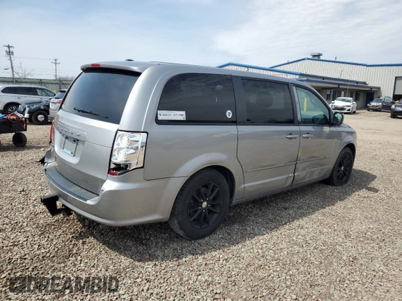 2014 Dodge Grand Caravan SXT with VIN 2C4RDGCG4ER114464, listed as a Copart auction lot 52480965 with 125,212 mi miles and Salvage Title. Bid and sale history available at DreamBid. Image 3.