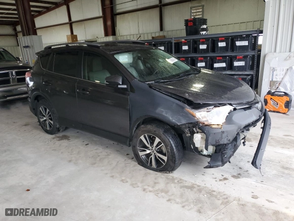 2017 Toyota RAV4 XLE with VIN JTMWFREV6HJ708292, listed as a Copart auction lot 45960185 with 256,078 mi miles and Salvage Title. Bid and sale history available at carsss.com. Image 4.