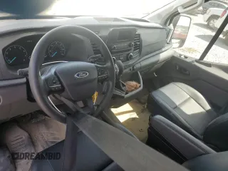 2024 Ford Transit Cargo with VIN 1FTYE1Y83RKA09653, listed as a Copart auction lot 50869985 with 5,549 mi miles and Salvage Title. Bid and sale history available at DreamBid. Image 8.