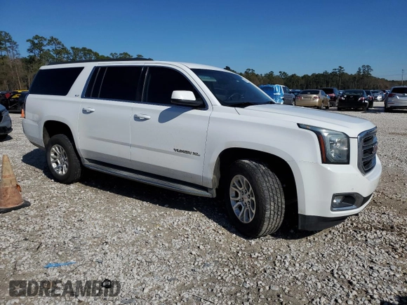 2015 GMC Yukon XL SLT with VIN 1GKS1HKC5FR255473, listed as a Copart auction lot 88680595 with 198,265 mi miles and Salvage Title. Bid and sale history available at carsss.com. Image 4.